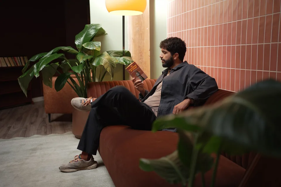 A creator in a styled Yaletown Podcast Studio set